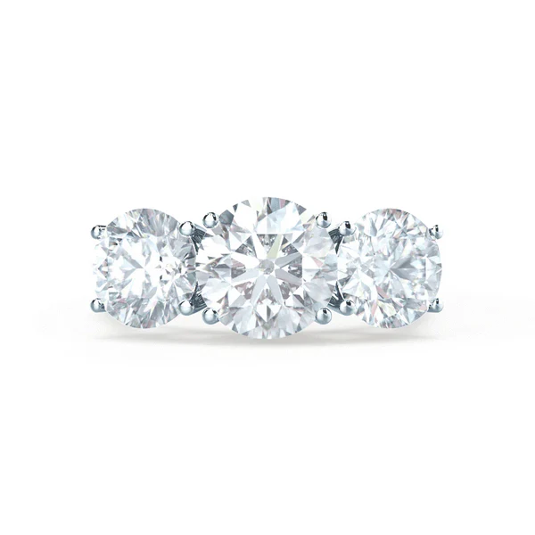 Certified Diamonds Lab grown diamonds are aesthetically and chemically identical to natural mined diamonds. We hand select every diamond to ensure the best in class cut, clarity, colour and luster and never compromise on quality. Each lab grown diamond is independently assessed, certified and accompanied with either a GIA or IGI certificate. Other grades of lab grown diamonds available on request. Specification Cut: Excellent cut Clarity: VS1 Certificate: GIA or IGI Certified Diamond Side Stones: Round Cut, D VS Lab Diamonds Metal: 18k White Gold Band Width: 2.1mm Setting: Three Stone Setting This ring is wedding ring friendly, and will fit most standard wedding rings This piece has been certified in accordance with the hallmarking Act 1973