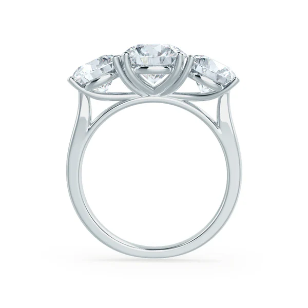 Certified Diamonds Lab grown diamonds are aesthetically and chemically identical to natural mined diamonds. We hand select every diamond to ensure the best in class cut, clarity, colour and luster and never compromise on quality. Each lab grown diamond is independently assessed, certified and accompanied with either a GIA or IGI certificate. Other grades of lab grown diamonds available on request. Specification Cut: Excellent cut Clarity: VS1 Certificate: GIA or IGI Certified Diamond Side Stones: Round Cut, D VS Lab Diamonds Metal: 18k White Gold Band Width: 2.1mm Setting: Three Stone Setting This ring is wedding ring friendly, and will fit most standard wedding rings This piece has been certified in accordance with the hallmarking Act 1973